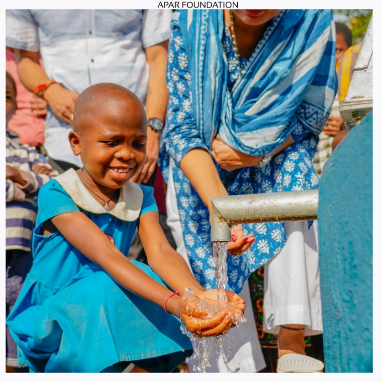 girl-drinking-from-water-pump.jpg